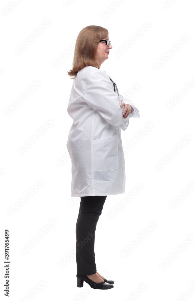 side view. serious female medic looking at a white screen side view. serious female medic looking at a white screen