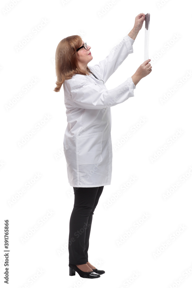 therapist carefully looking at the x- ray . isolated on a white therapist carefully looking at the x- ray . isolated on a white