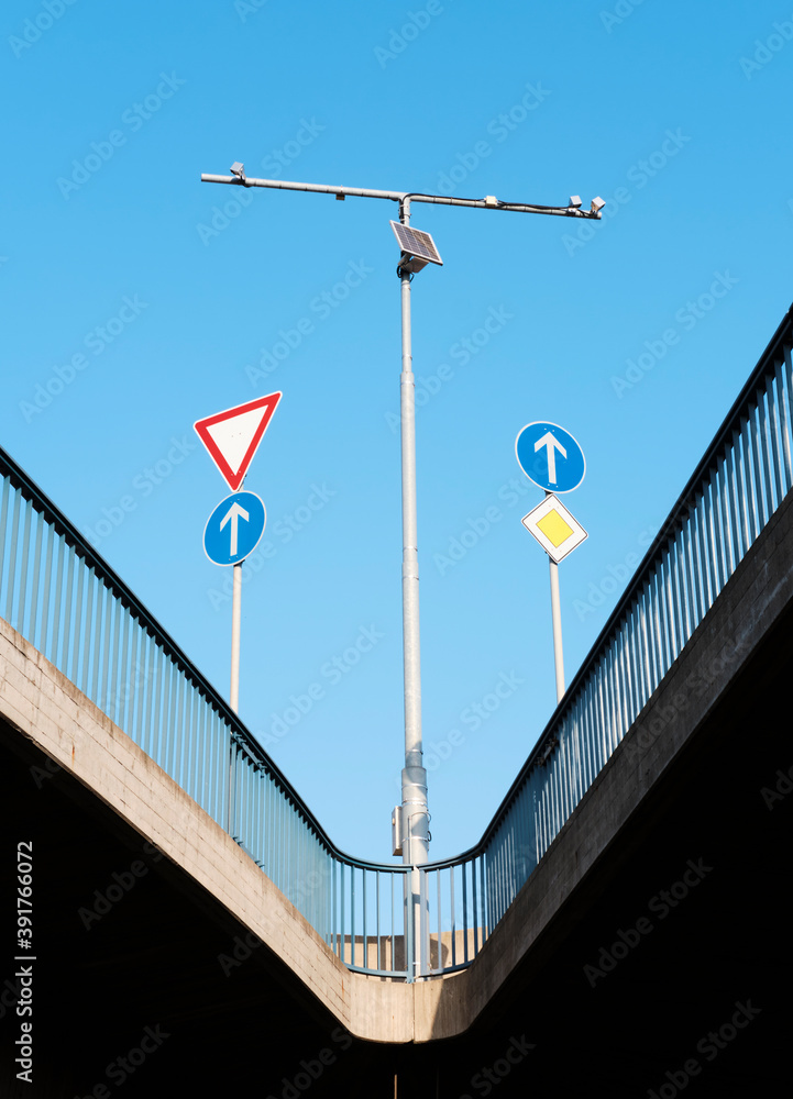 road signs on an overpass road signs on an overpass