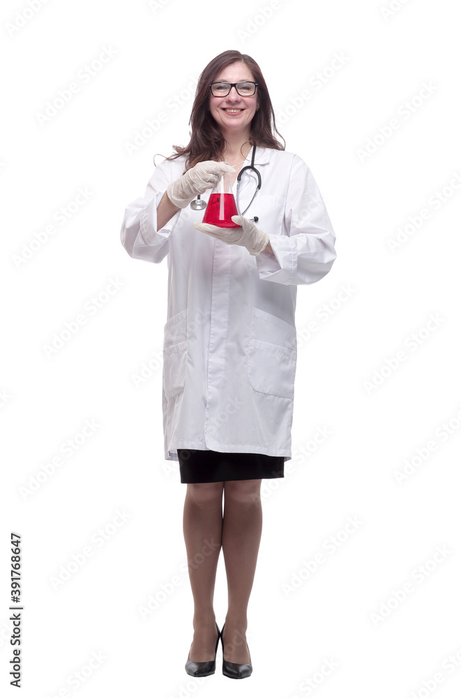 in full growth. smiling female therapist with a laboratory flask in full growth. smiling female therapist with a laboratory flask