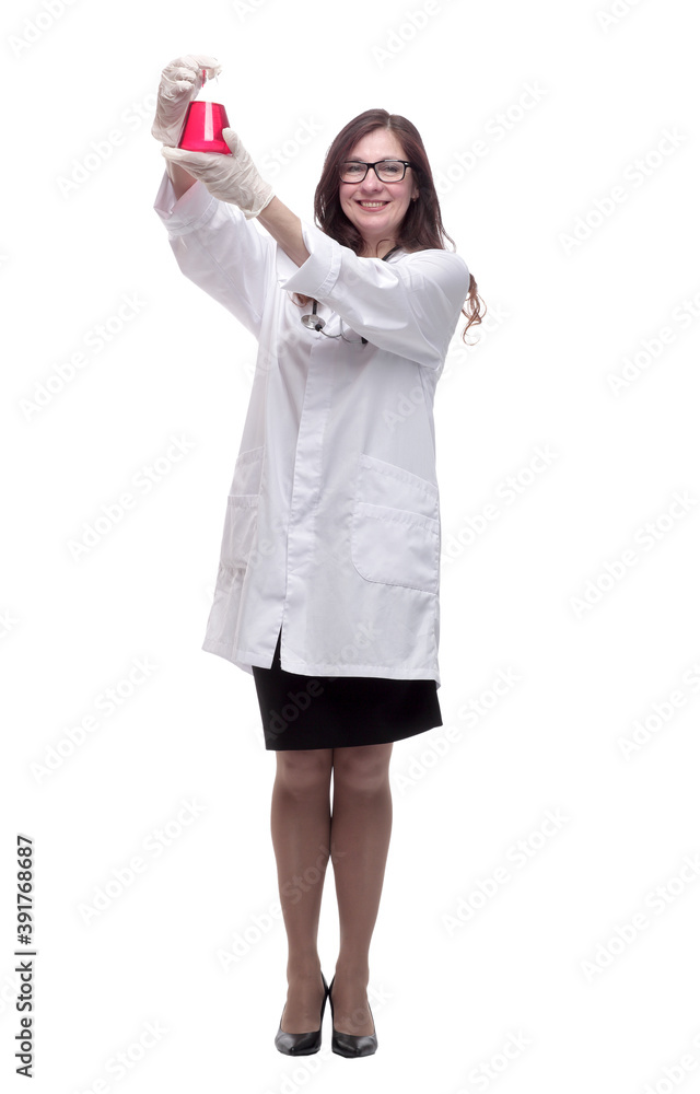 in full growth. smiling female therapist with a laboratory flask in full growth. smiling female therapist with a laboratory flask