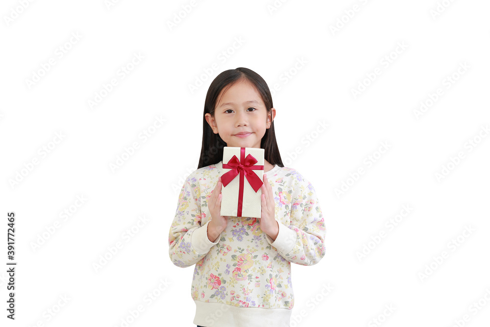 Beautiful asian little kid girl holding gift box on white background. with clipping path Beautiful asian little kid girl holding gift box on white background. with clipping path