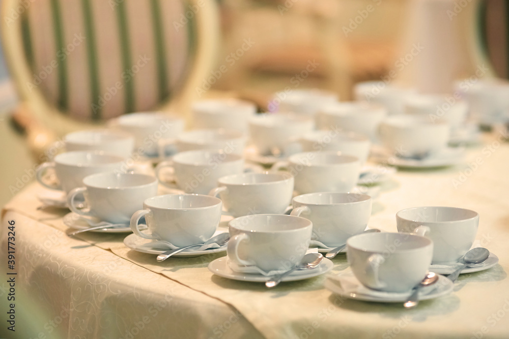 a lot of tea mugs, top view of the tea pairs. Tea party a lot of tea mugs, top view of the tea pairs. Tea party