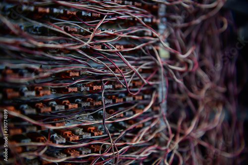 Messy telephone switchboard wire in box