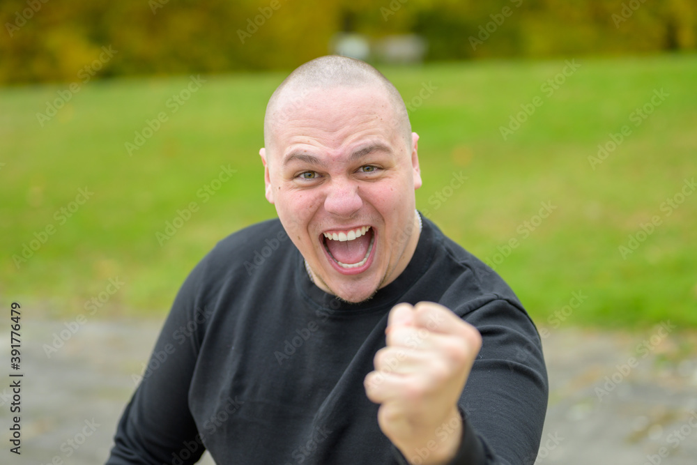 Aggressive threatening angry young man Aggressive threatening angry young man