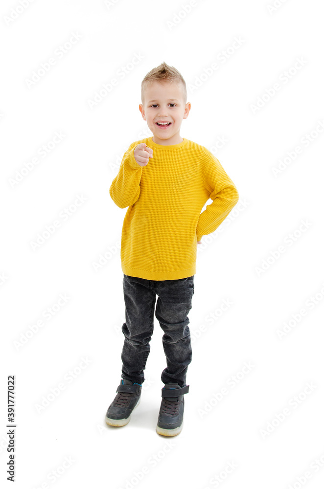 Handsome little boy pointing at you. Dressed in casuals. Isolated on white background
Handsome little boy pointing at you. Dressed in casuals. Isolated on white background