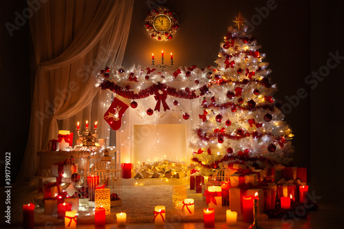 Christmas Room Interior Design. Xmas Tree Decorated By Lights. Fireplace and Clock. Presents Gifts Toys  Candles and Garland Shining at Night