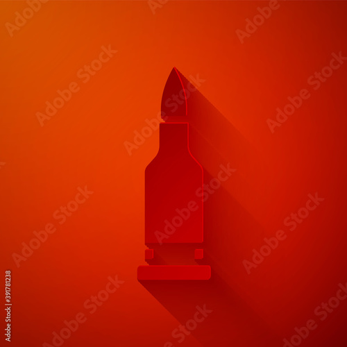 Paper cut Bullet icon isolated on red background. Paper art style. Vector.