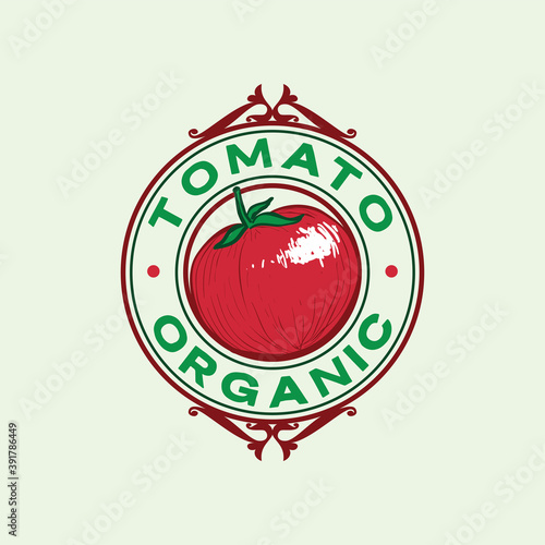 Fresh harvest red tomato hand drawn vintage and retro emblem logo design illustration