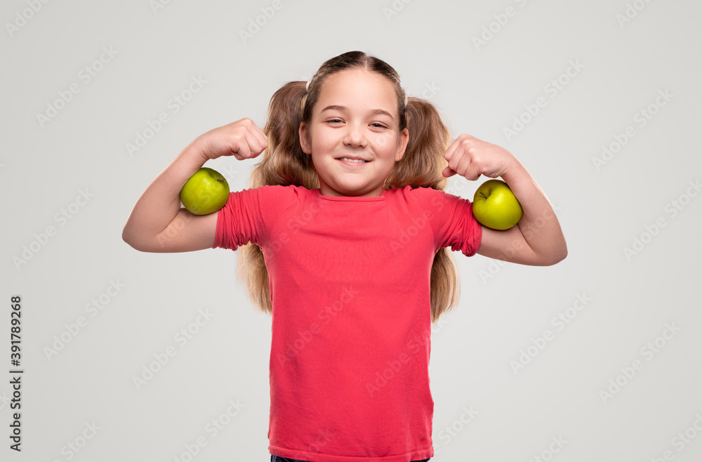 Strong happy girl with apples Strong happy girl with apples