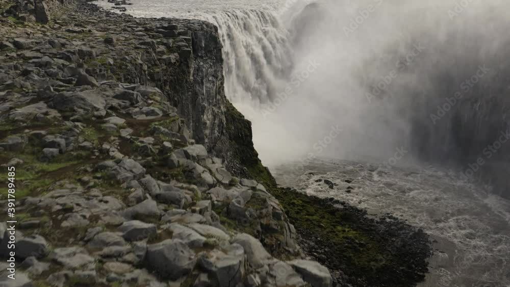 Aerial: Breathtaking waterfall Detifoss Largest waterfall in Europe Iconic tourist attraction in Iceland Aerial: Breathtaking waterfall Detifoss Largest waterfall in Europe Iconic tourist attraction in Iceland