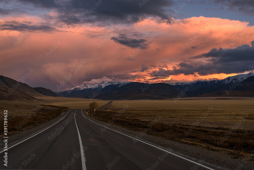 road mountains sunset clouds sky