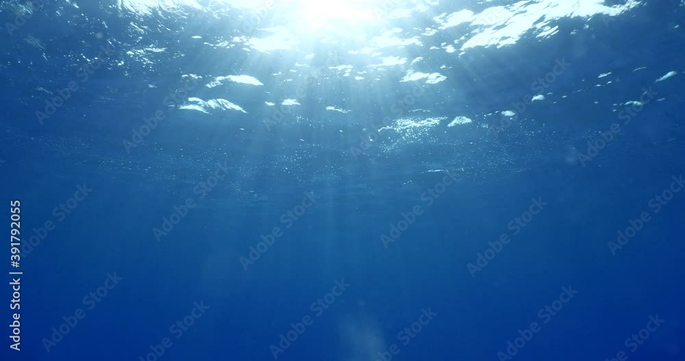 sun ray and sun beam scenery underwater waves on surface of water slow ocean scenery sun ray and sun beam scenery underwater waves on surface of water slow ocean scenery