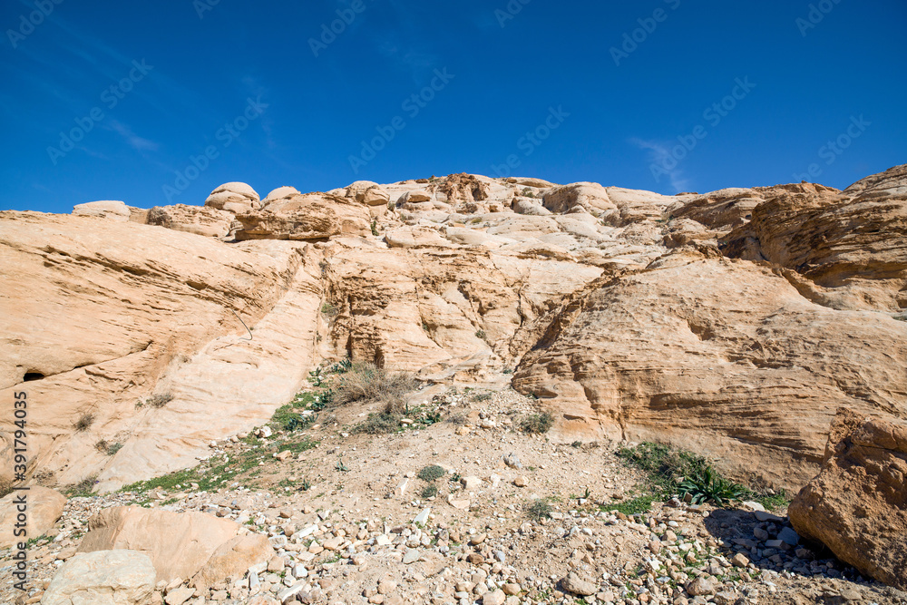 Mountain landscape around Djinn Blocks - stone tower tombs in Petra, Jordan