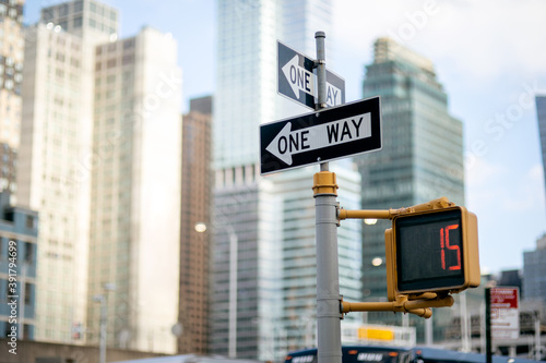 One way rod sign and traffic light in NYC