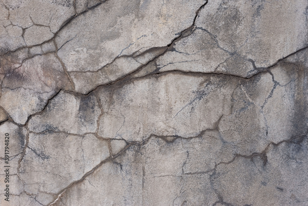 Obraz premium texture of street decorative plaster with cracks, warm shades