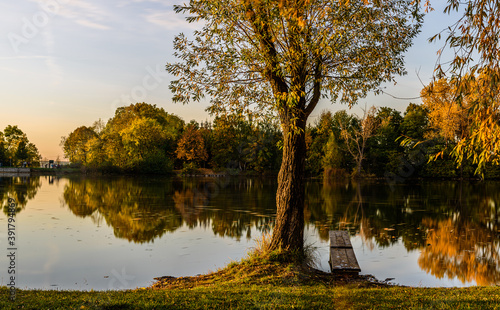 Beautiful autumn colours during sunset at Vestecky rybnik (Vestec pond) near Prague.