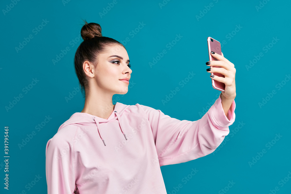 Portrait of pretty millennial hipster young woman taking selfie Portrait of pretty millennial hipster young woman taking selfie