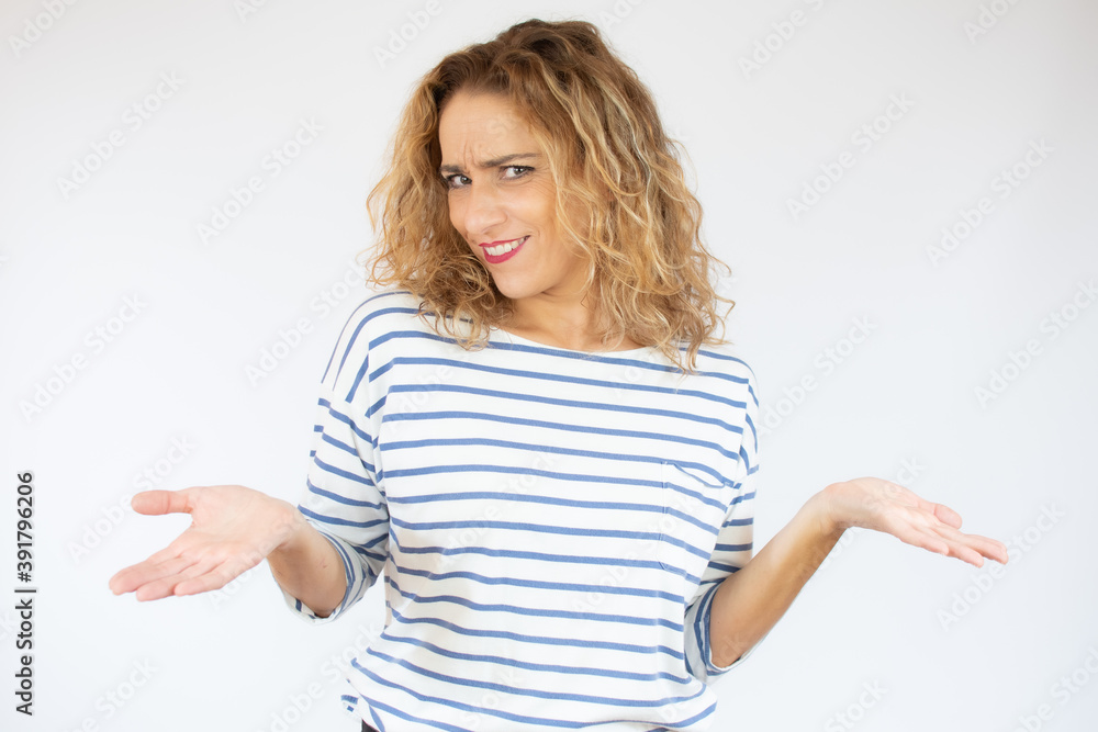 Caucasian woman in casual t-shirt over isolated background doing doubtful gesture Caucasian woman in casual t-shirt over isolated background doing doubtful gesture