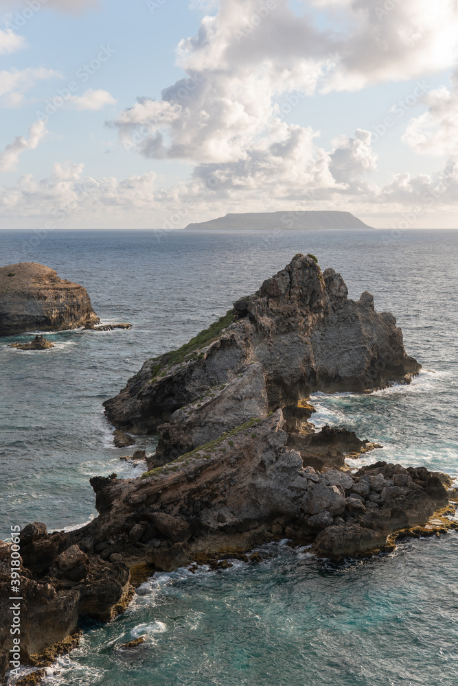 The view of rock formations in the Atlantic Ocean can be seen from the top of Pointe des Chateaux, Guadeloupe in the Caribbean 