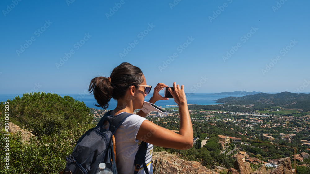 Girl taking a picture with her smartphone