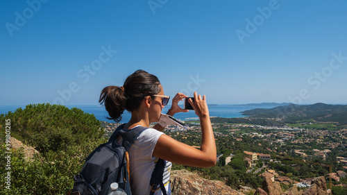 Girl taking a picture with her smartphone