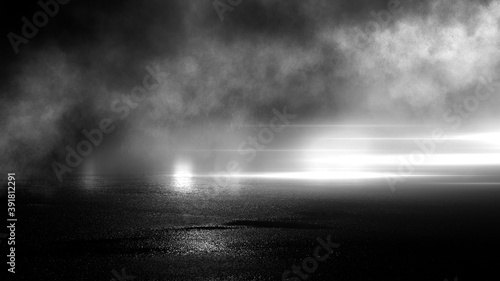 Dark street, black background, glare of light on the wet asphalt. Rays and lines, smoke. Dark city street.