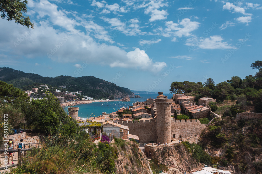 Medieval town on the coast of Catalonia. The views from de top of the town with nice clouds and vivid colours to awake the sense.