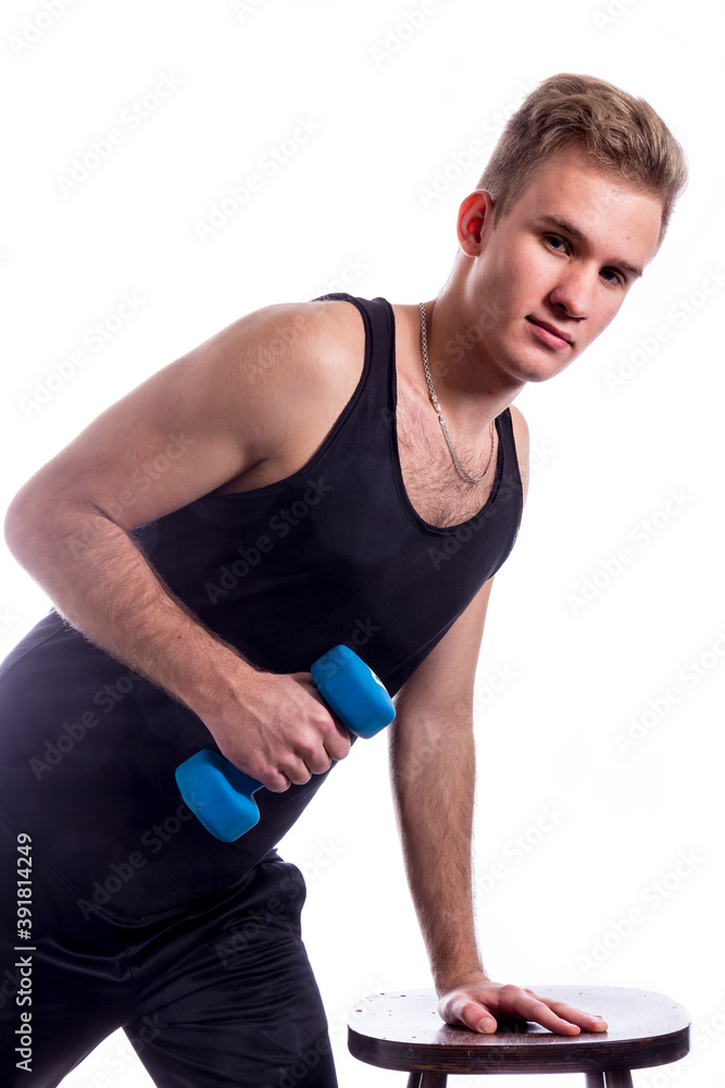 Young sportsman making exercises with dumbbels studio portrait on white background,