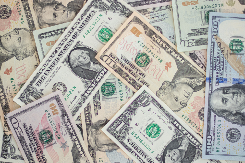 American paper dollar bills as part of the global financial and trading system.Top view. American paper dollar bills as part of the global financial and trading system.Top view.