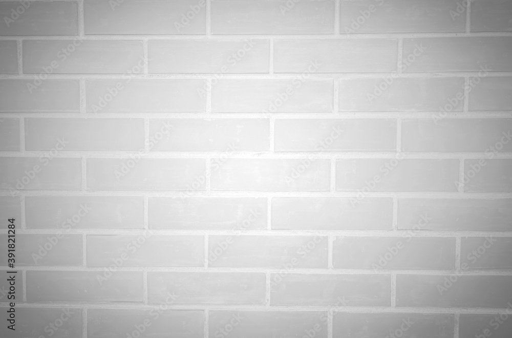 Fototapeta premium Vignette of White brick background pattern, photos of modern white brick wall texture for background, soft white brick wall texture is an integral part of the house, black and white photo.