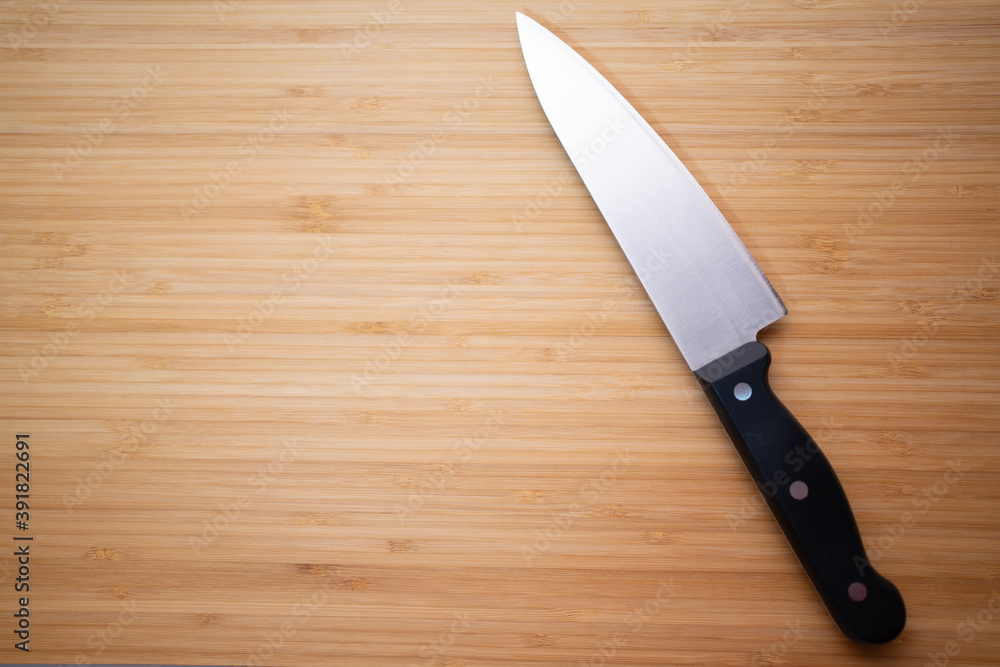 Knife on the background of the cutting board Knife on the background of the cutting board
