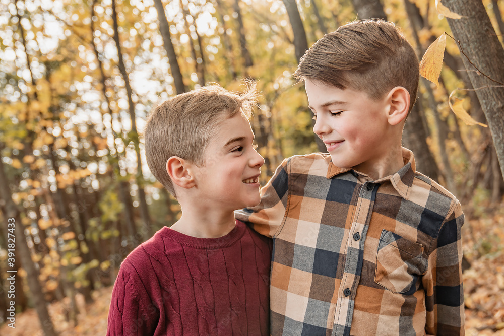 kids in autumn forest having great time together kids in autumn forest having great time together