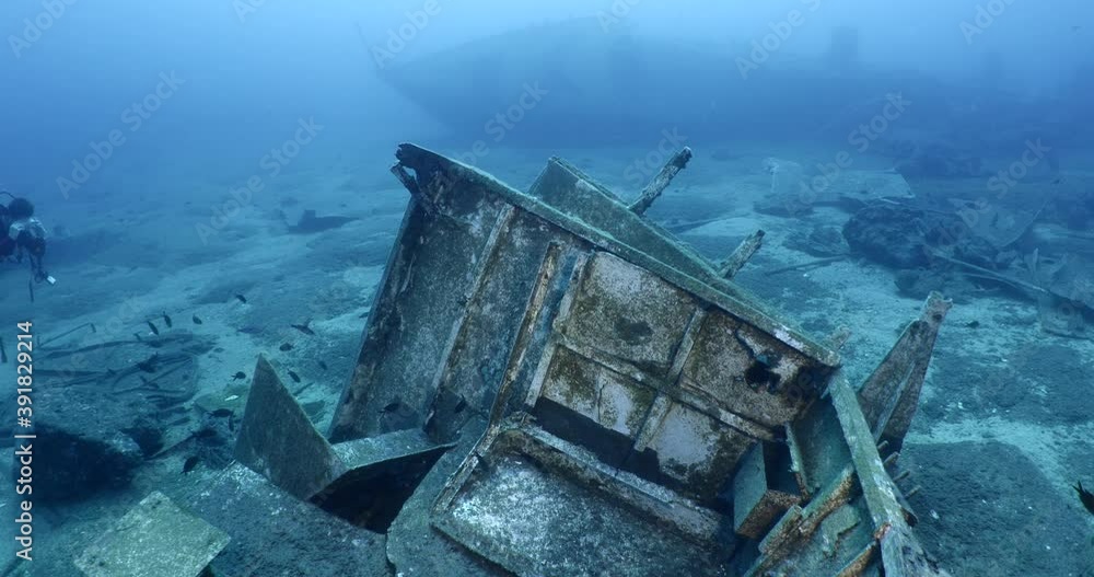 scuba divers exploring shipwreck scenery underwater ship wreck deep blue water ocean scenery of metal underwater scuba divers exploring shipwreck scenery underwater ship wreck deep blue water ocean scenery of metal underwater