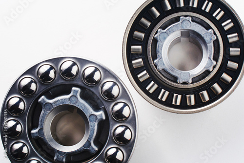 Metal thrust bearing. Ball and Roller bearing isolated on white background. Spare part for heavy and automotive industry. Machinery concept.