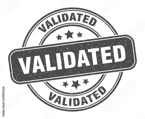 validated stamp. validated label. round grunge sign