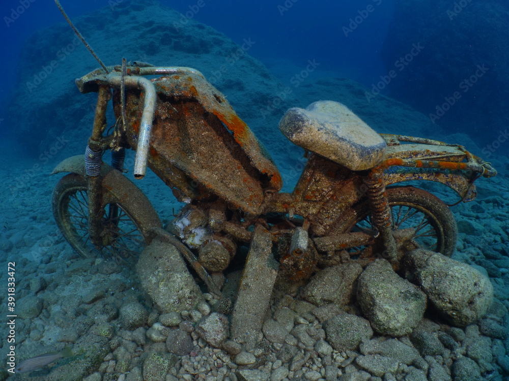motorcycle bike underwater some fish around motorbike wreck underwater