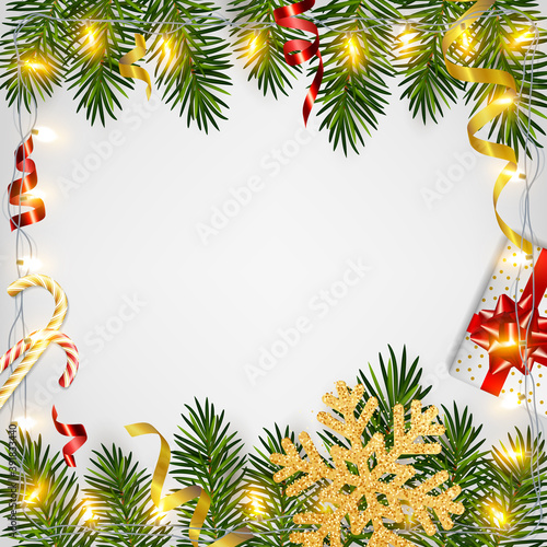 Christmas background with realistic pine branches, shining garlands, gifts box, candy, glitter gold snowflake, tinsel. Template for Christmas and New Year greeting card, poster, postcard, banner