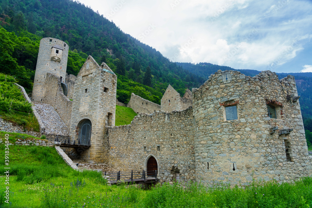 Cycleway of Pusteria valley: ruins of castle at Chiusa Cycleway of Pusteria valley: ruins of castle at Chiusa