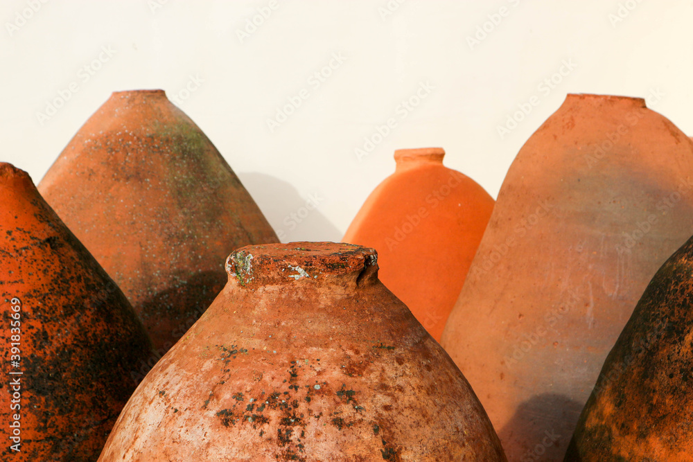 custom made wallpaper toronto digitalancient clay earthenware vessels for wine on white wall background