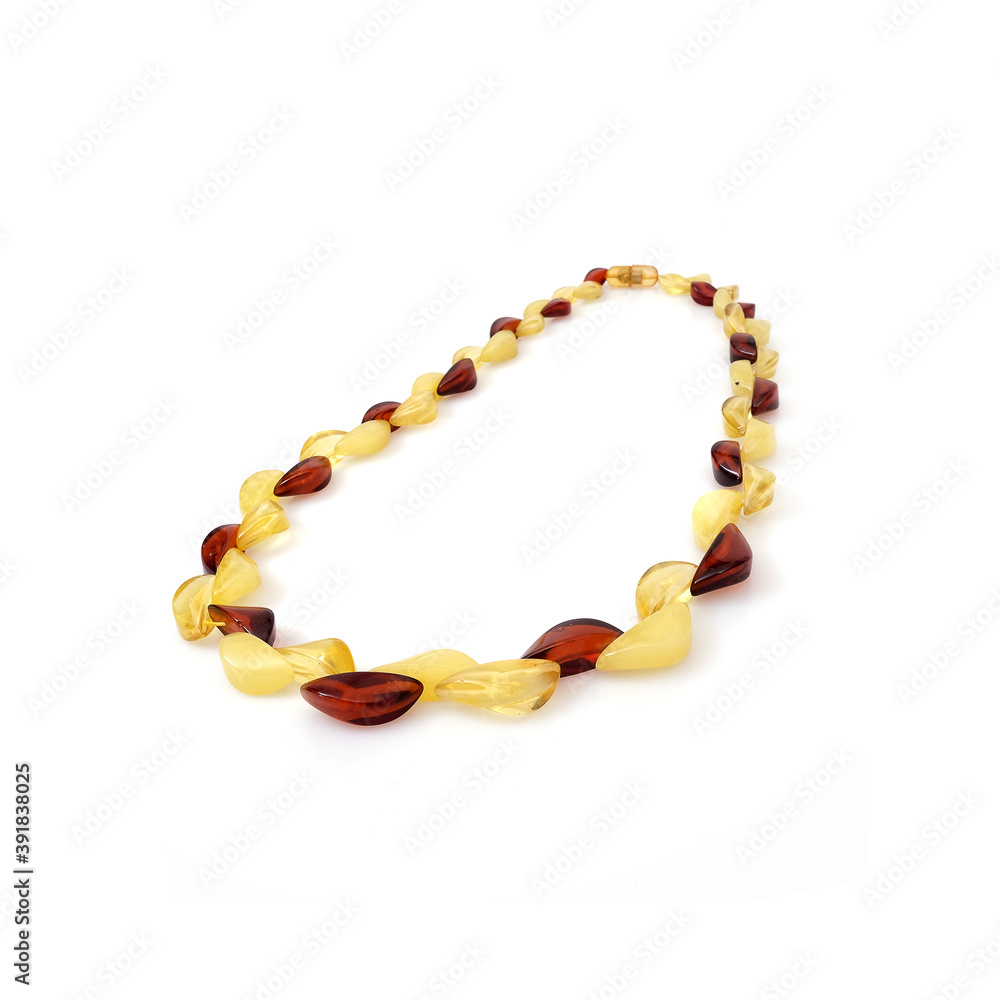 Amber necklace isolated on a white background Amber necklace isolated on a white background