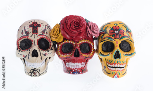 colorful sugar skulls isolated on white background