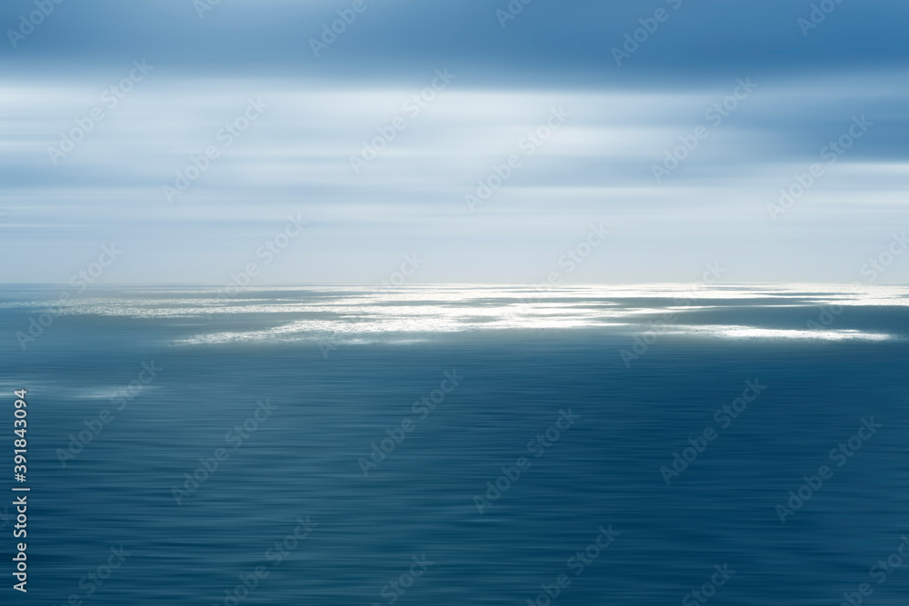 Creative artistic photo of the sea, blurry surface, blurry motion. Sea and sky. Blurry effect, postcard. Motivation. Journey concept. Peacefull sea or ocean