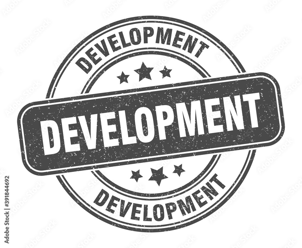 development stamp. development label. round grunge sign