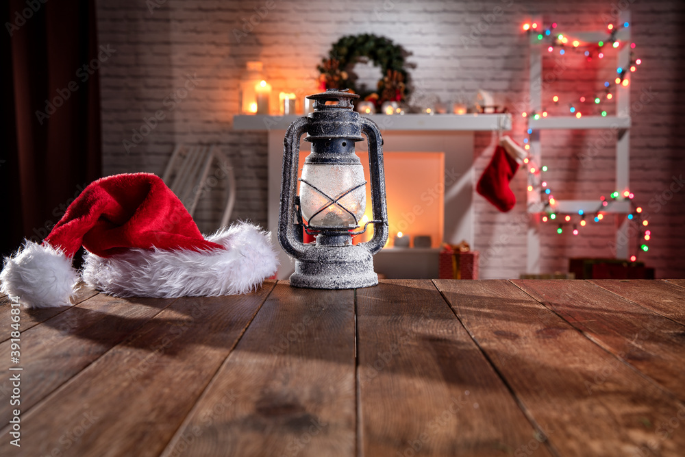 Obraz premium Christmas wooden table with attributes for preparing the holidays in a nice, romantic interior