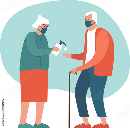 Safety measures for elderly people during coronavirus COVID-19 disease pandemic. Old couple wearing protective masks sanitizing hands
