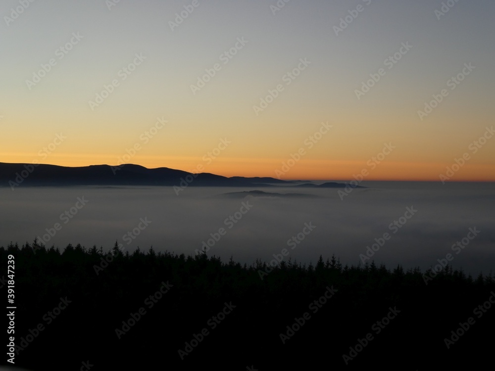 sunrise above the clouds of inversion i the valley