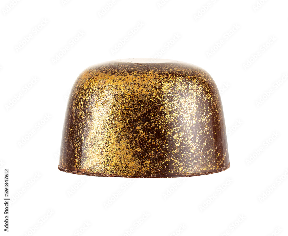 Closeup of luxury handmade bonbon with gold splashes isolated on white background Closeup of luxury handmade bonbon with gold splashes isolated on white background