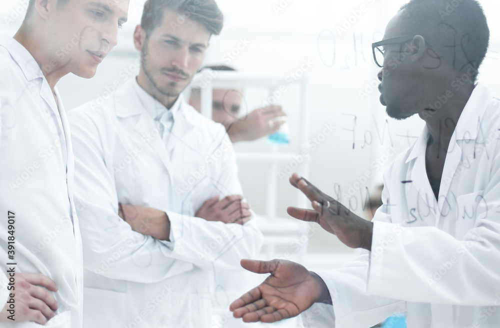 background image is a group of scientists microbiologists. background image is a group of scientists microbiologists.