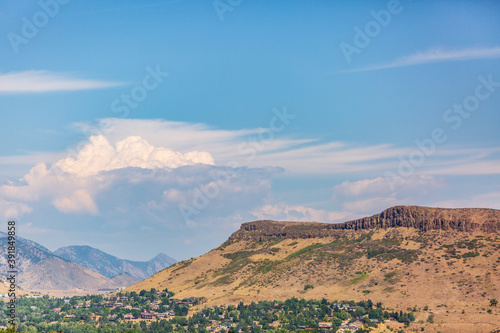 Clouds fill the sky over Table Mountain, Golden, Colorado